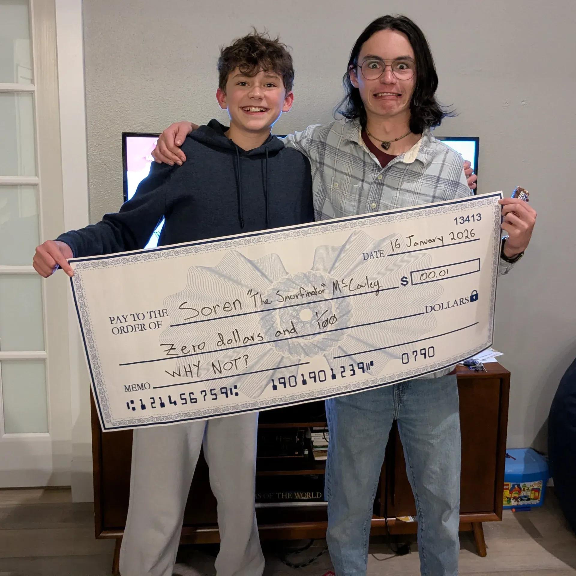 Happy students celebrating scholarships in library